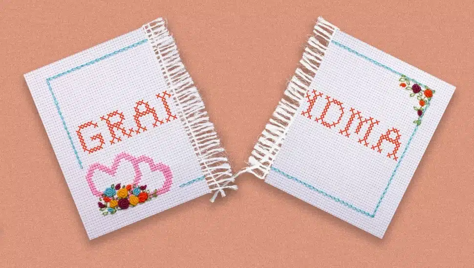An embroidery of the name Grandma torn apart.
