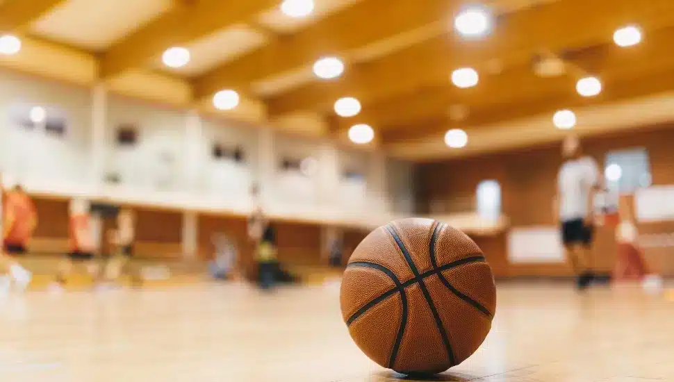 A basketball on the court.