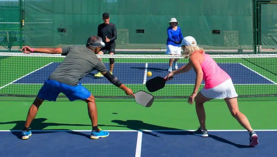 People playing pickleball.