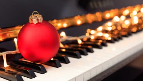 lights and ornament on piano keys
