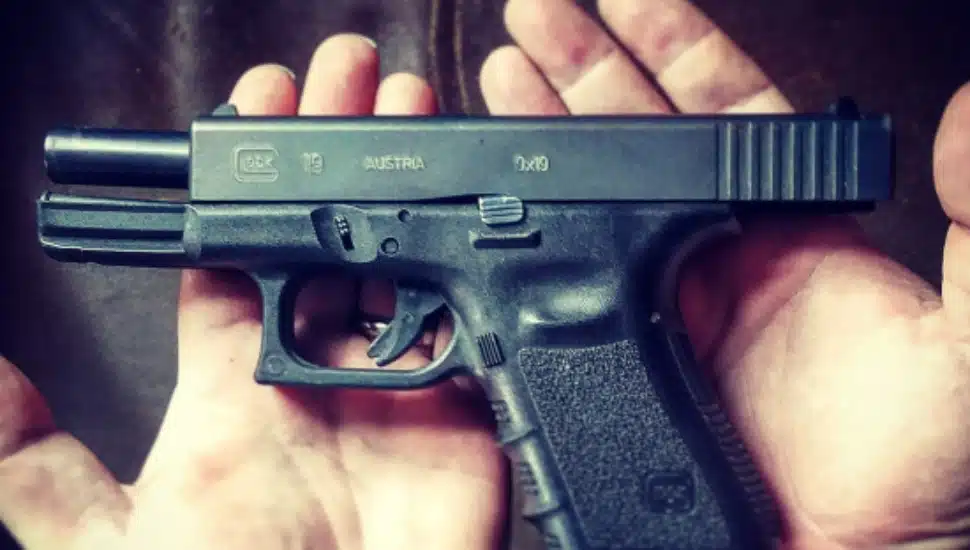 A person holding a gun.