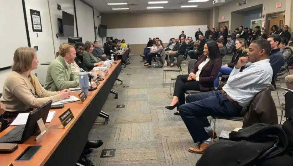 Montgomery County Commissioners’ Chairman Ken Lawrence Jr. and Vice Chairwoman Jamila Winder talk with members of Norristown Municipal Council.