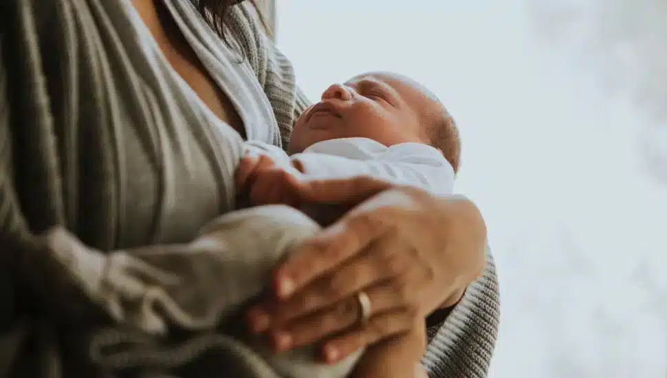 A mom and her newborn.