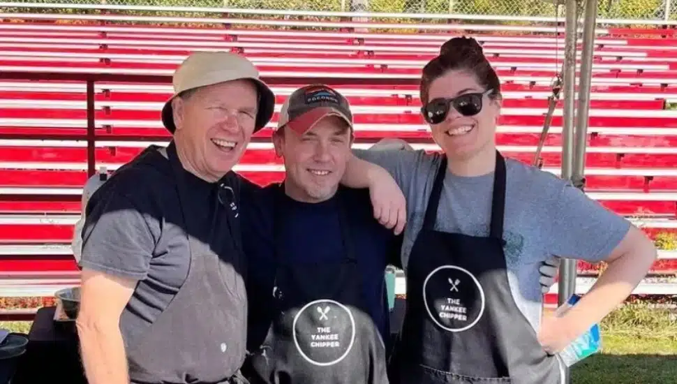 Eric Connor with his dad, Mike, and his wife, Leigh Rarig.