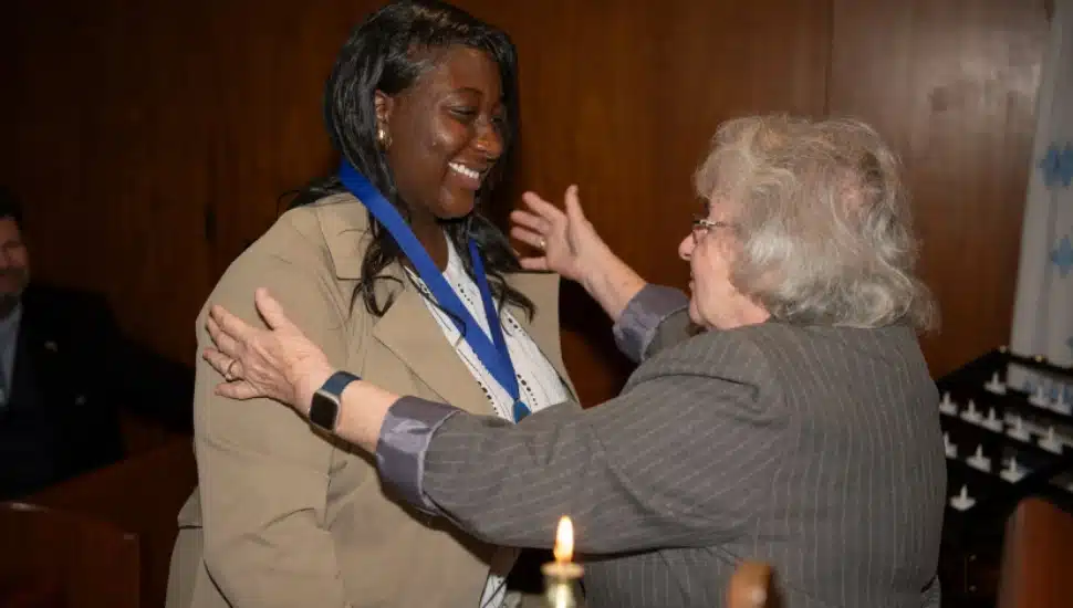 Tamara Ellerbe receives the Mother Josaphat Medal from Provincial of the Sisters of Saint Basil the Great, Sister Joann Sosler, OSBM.