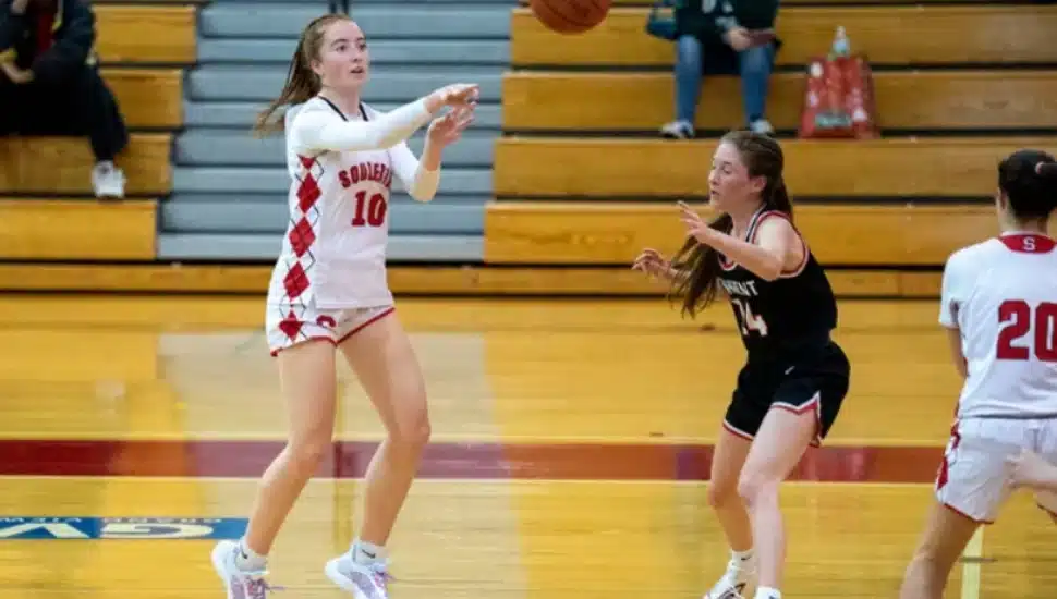 Brooke Fenchel playing basketball.