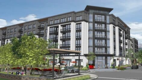 A rendering shows the future 217-unit apartment building at the site of a former Lord & Taylor store at 121 E. City Ave.