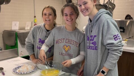 West Chester University (WCU) student-athletes from the women’s lacrosse team are pictured in the Food Lab enjoying a healthy cooking demonstration presented recently by the Student-Athlete Sports Nutrition Education and Fueling Program.