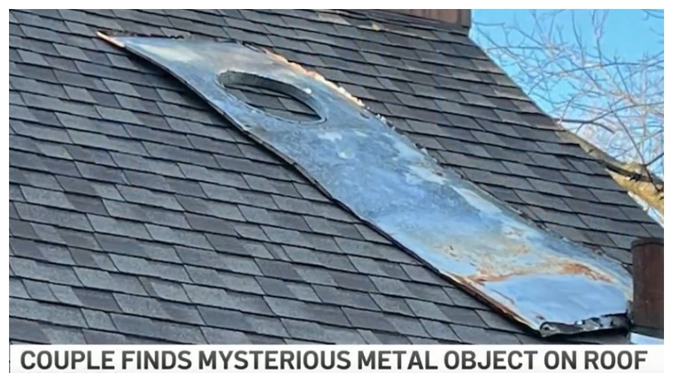 The residents of a Mount Airy home randomly found a metal object on their roof. It's unclear what it is.