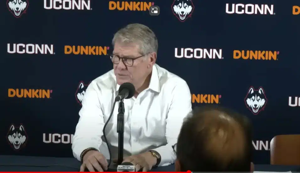 Screenshot of Geno Auriemma at a press conference.