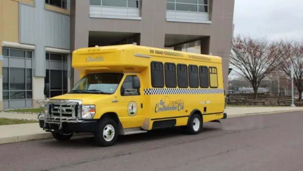 yellow Conshohocken Cab parked