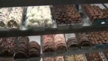 An assortment of Asher's Chocolates displayed.
