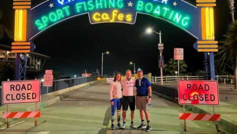 Jenny Mallick, Matt Walker and Michael Mallick at the Santa Monica Pier get ready for their 340-mile run.