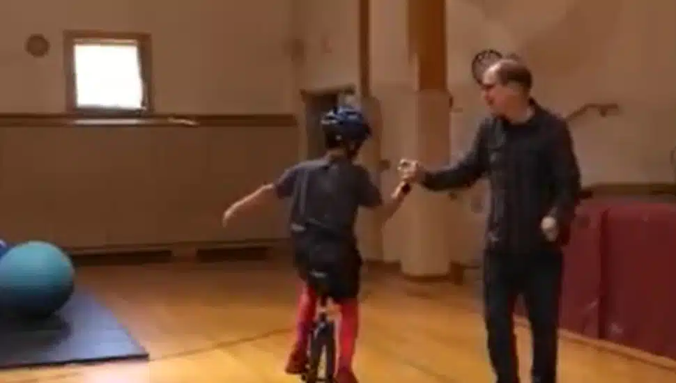 Will Starr helping student prepare for circus.