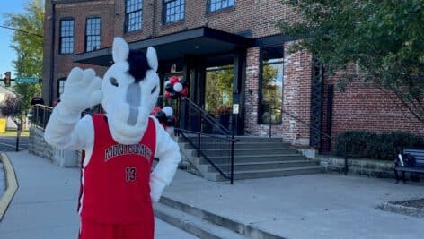 Image of the Mustang mascot in front of MCCC's campus.