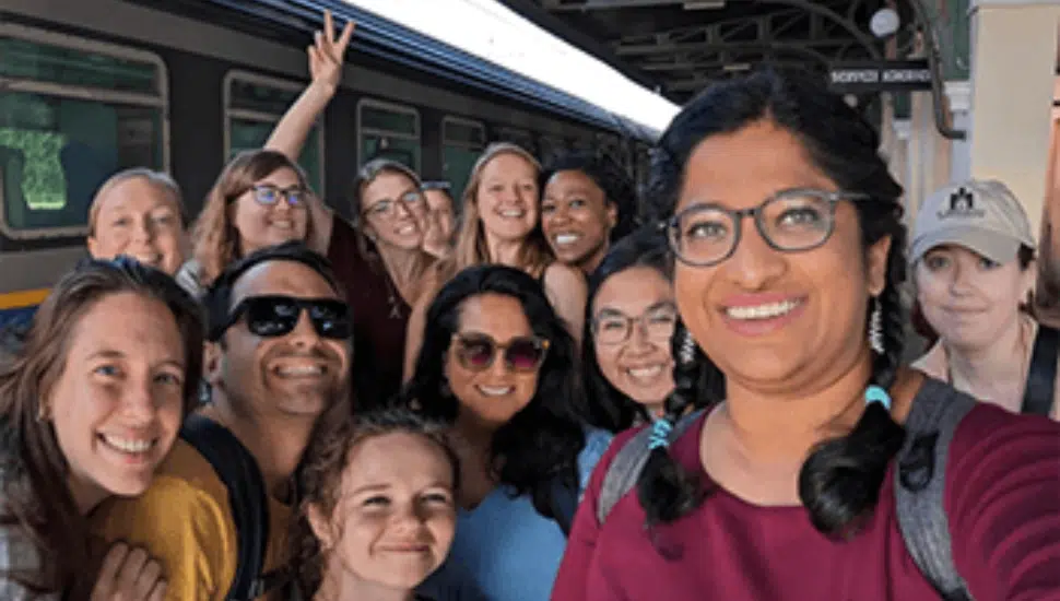 Van Allen and others gathered on a train platform while on the synod in Rome.