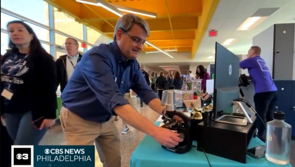Upper Merion High School science teacher Pete Vreeland checks out an exhibit at the 2024 STEELS Expo.