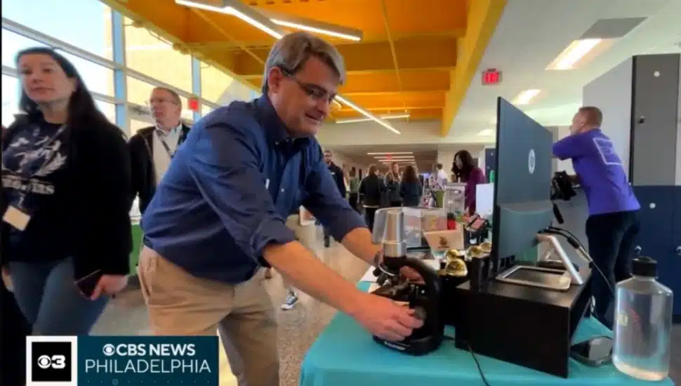 Upper Merion High School science teacher Pete Vreeland checks out an exhibit at the 2024 STEELS Expo.