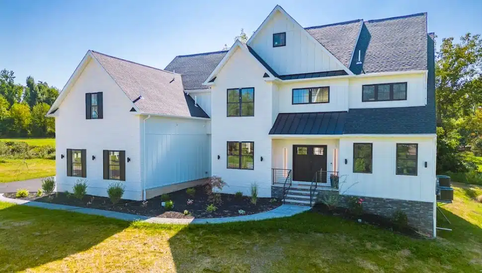 A new construction Ambler farmhouse in the Tennis Pointe development is for sale.
