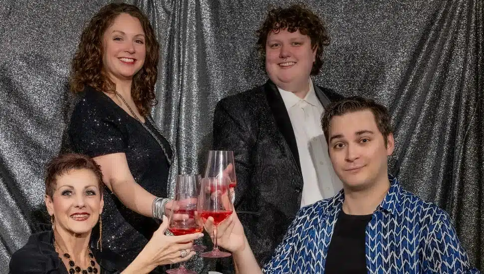 Cast of "The Prom" posing on stage, promoting the play running at the Steel River Playhouse May 25 to Jun. 9.