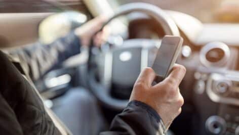 Distracted driver using a cell phone while driving