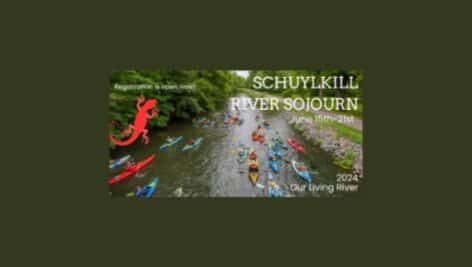 picture of a previous year's Schuylkill River Sojourn, with kayaks along the river.