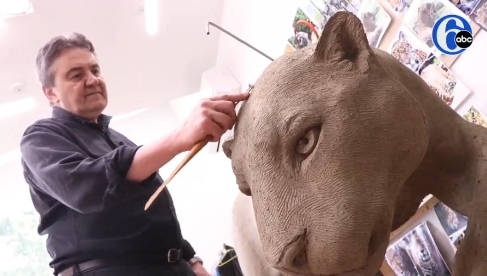 Sculptor Zeonos Frudakis works on one of the animal sculptures he's creating for the Elmwood Park Zoo.