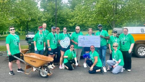 A group of Team Members from Penn Community Bank gather for a group photo on their Day of Service on Jun. 5.