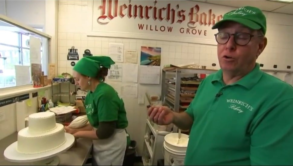 Herman and Beth Weinrich, owners of Weinrich's Bakery in Willow Grove, work on some cakes.