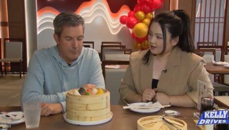 Bob Kelly of Kelly Drives checks out the Lucky Six soup dumpling sampler wih Yvonne Yang, managing partner for Nan Xing Soup Dumplings in King of Prussia.