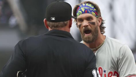 Bryce Harper talking passionately to an MLB umpire.