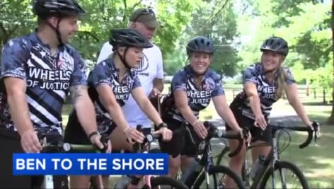 Jason Adams along with his in-laws riding a bike.