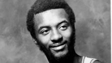 Black-and-white image of Joe Bryant during his Philadelphia 76er days.