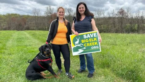 two women with dog