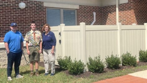 Bobby Ross, with Chester County Boy Scout Troop 93, stands with Lisa Harner, Arc Director of Administration, and Brendan Degnan, Facilities Coordinator.