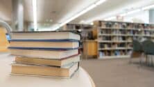 stack of books in library