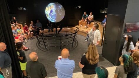 Catherine Rauenzahn, MCCC Youth Engagement Program Manager, showed students and family members the College’s Science on a Sphere and the planetary data it displays. As part of Montco 360, participants will be able to use the College’s facilities.