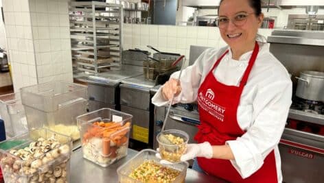 2023-24 Food Sustainability Fellow in the Hospitality Institute Jennifer Fanega prepares meals for the Food Recovery Program at Montgomery County Community College. The program received the Innovation of the Year Award by The League for Innovation in the Community College. Fanega and Director of the Hospitality Institute Karima Roepel began the program in Fall 2023.