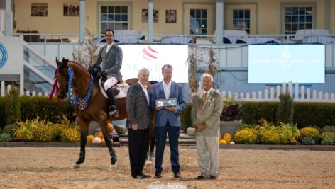 Marc Pelletier, SVP of Commercial Lending at Meridian Bank, presenting the "Speed Stake" award ($10,000) to the Feature Class champion in the Dixon Oval.