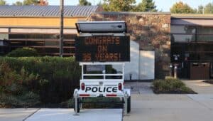 Street sign congratulating Officer Bendig on his career.