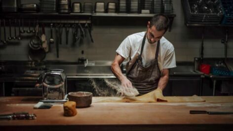 Anthony Andiario preparing food.