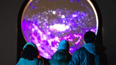 Visitors taking in the Astra Lumina exhibit.