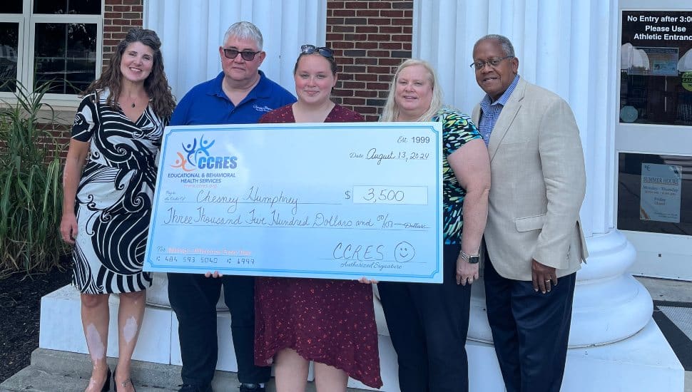 Shown with the scholarship award check are (from left) Jennifer Hernandez, Coordinator of Business Development; Mr. and Mrs. Humprey, Chesney, and Leon Spender, CCRES Board Member.