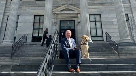 DA Steele and Barney the Courthouse Comfort Dog.