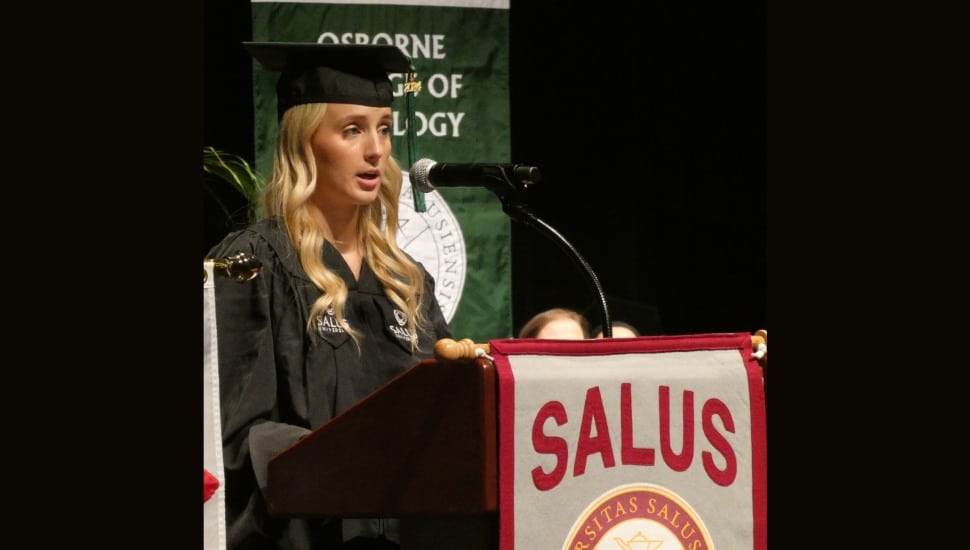 Taylor Schanne, MMS ‘24, who gave the graduate commencement address for the Class of 2024, stands at the podium.