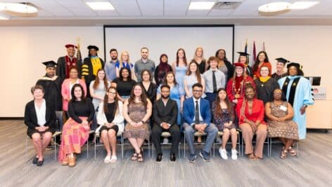 Group photo of chapter of the Alpha Alpha Alpha National Honor Society for first-generation college students at MCCC.