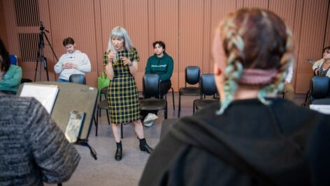 Melissa Dunphy, an acclaimed and award-winning composer known for her vocal, political, and theatrical music, stands before her students at WCU, guiding them in their artistic endeavors.