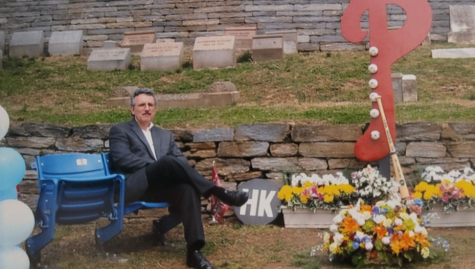 Joe O'Loughlin sitting on a bench.