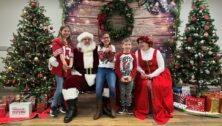 The Guay Family enjoys a visit with Santa at the Arc's Annual Holiday Fun Fest