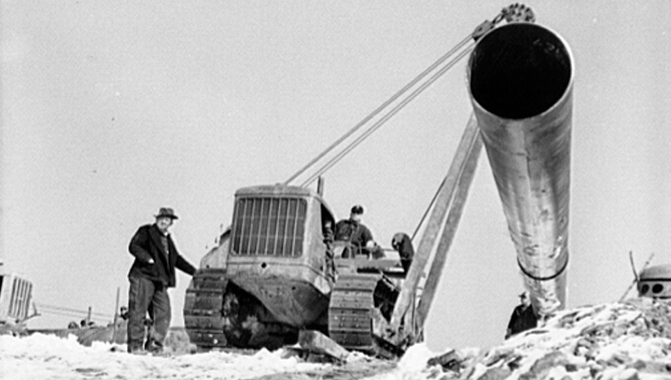 Big Inch pipeline being put in, black and white.